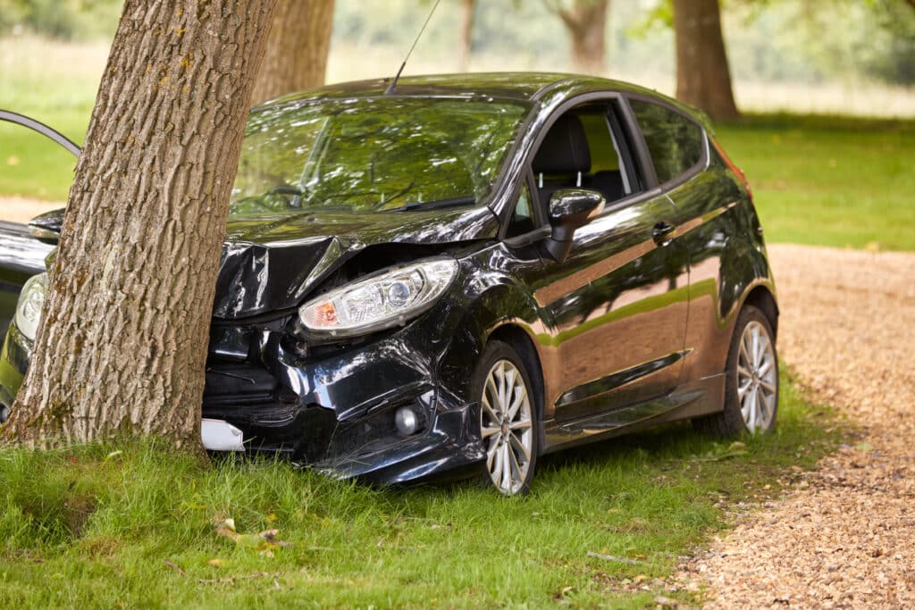 Car Crashed Into Tree After Accident On Country Road