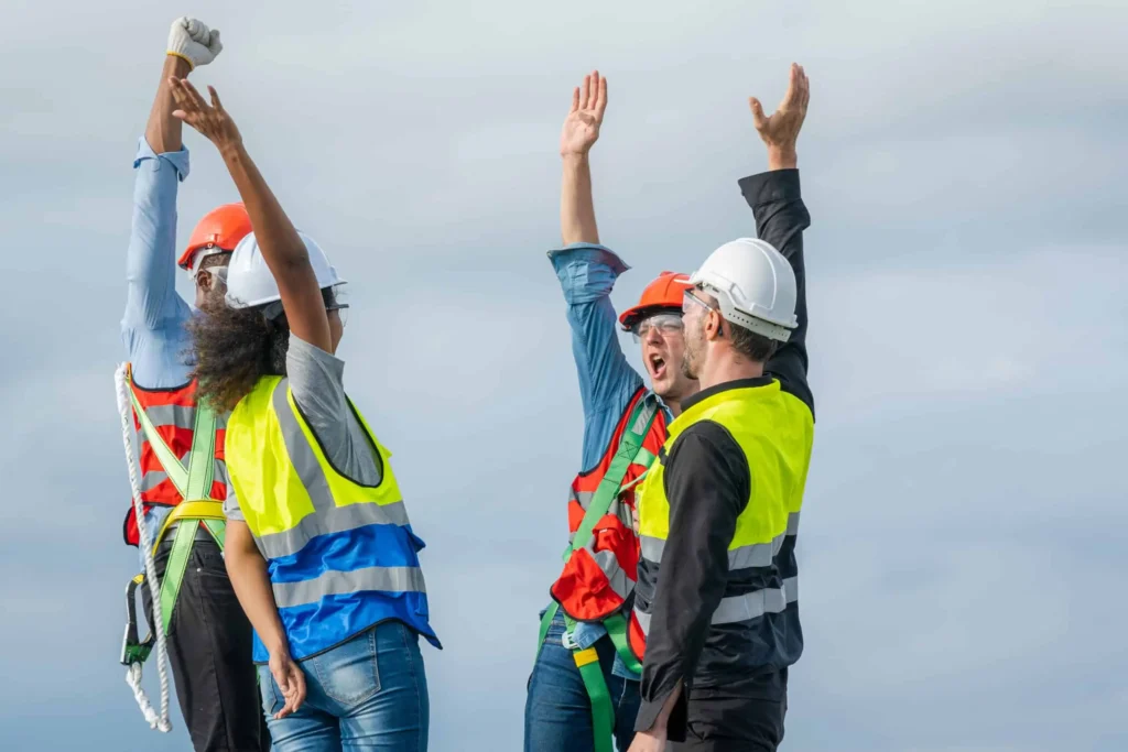 Construction workers wearing helmets